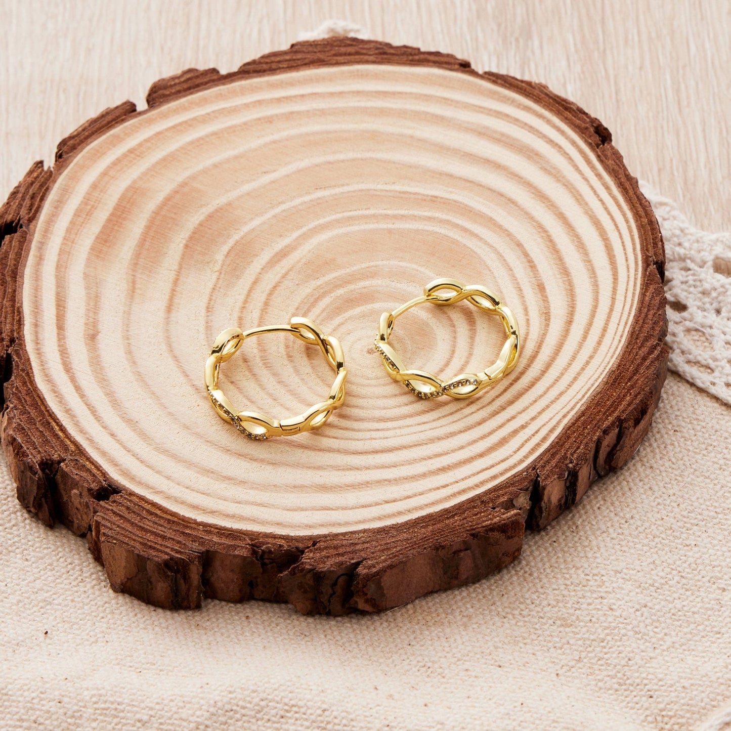 Gold Plated Infinity Hoop Earrings Created with Zircondia® Crystals