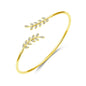 Gold Plated Leaf Bangle Created with Zircondia® Crystals