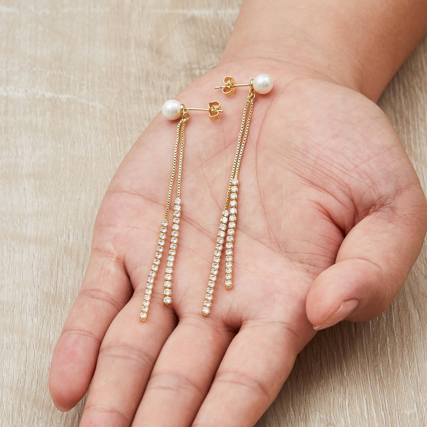 Gold Plated Pearl Dangle Earrings Created with Zircondia® Crystals