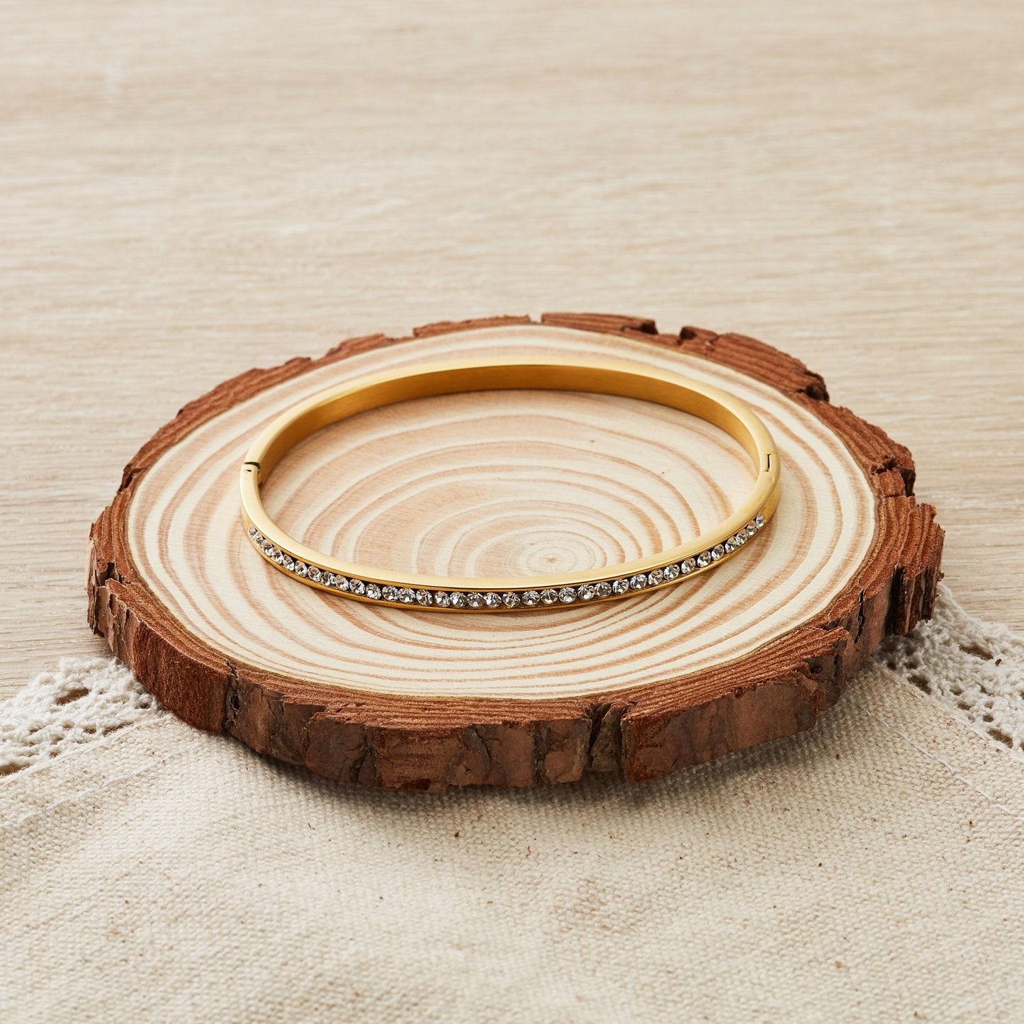 Gold Plated Stainless Steel Channel Set Bangle Created with Zircondia® Crystals (7 Inch)