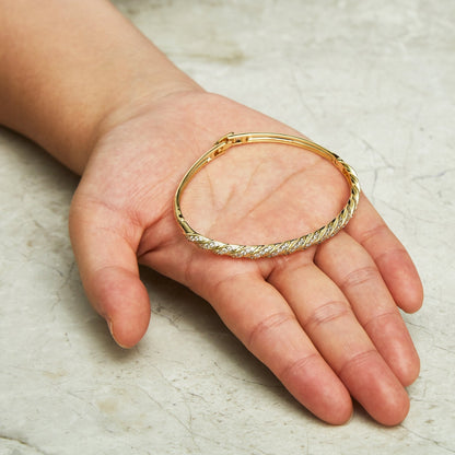 Gold Plated Twist Bangle Created with Zircondia® Crystals (7 Inch)