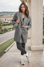 Veste texturée boutonnée avec poches avant