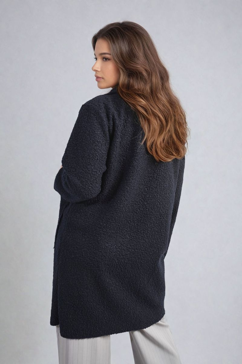 Veste texturée boutonnée avec poches avant