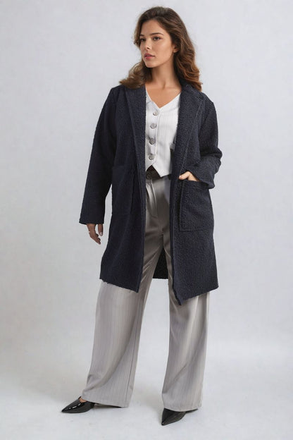 Veste texturée boutonnée avec poches avant