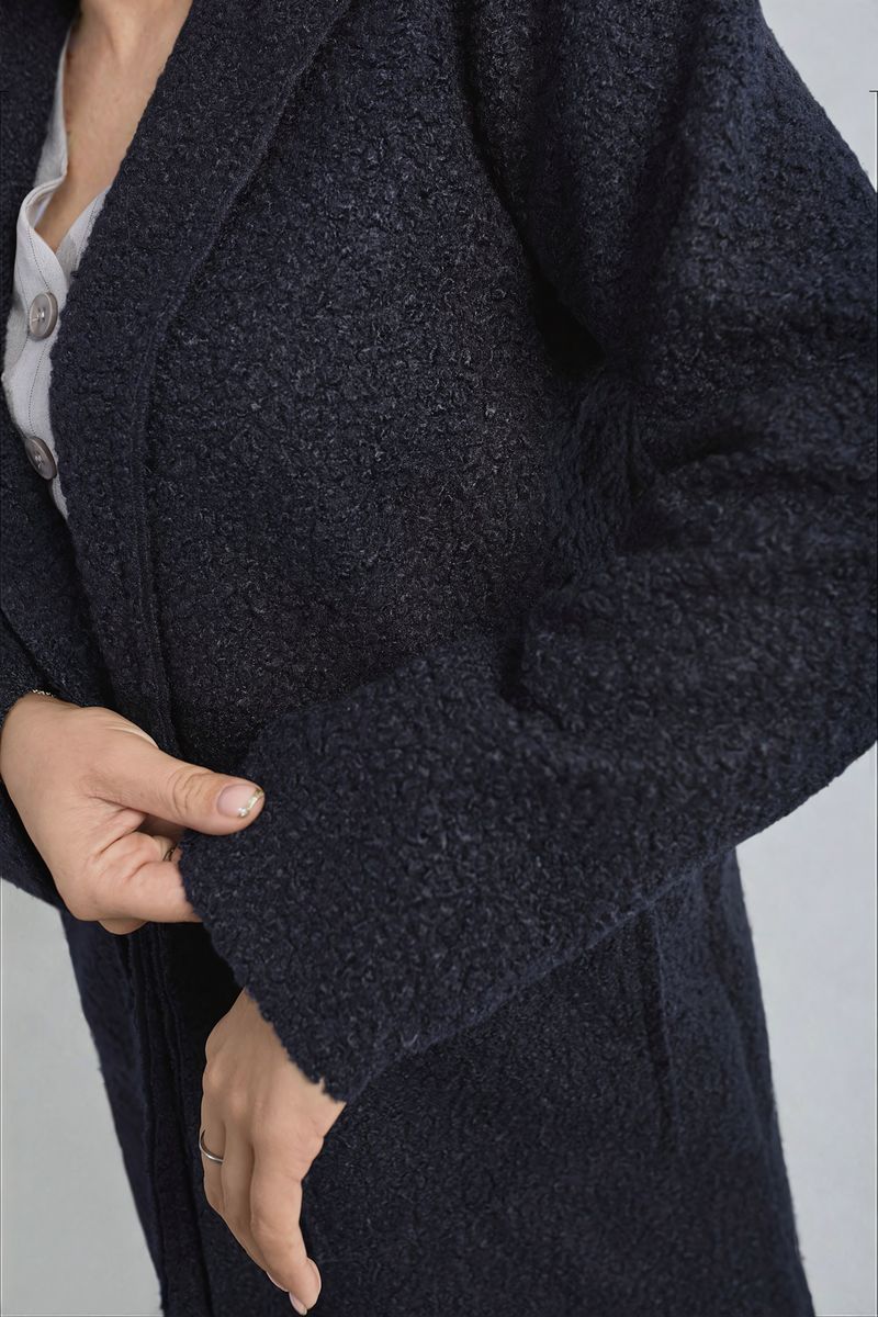 Veste texturée boutonnée avec poches avant