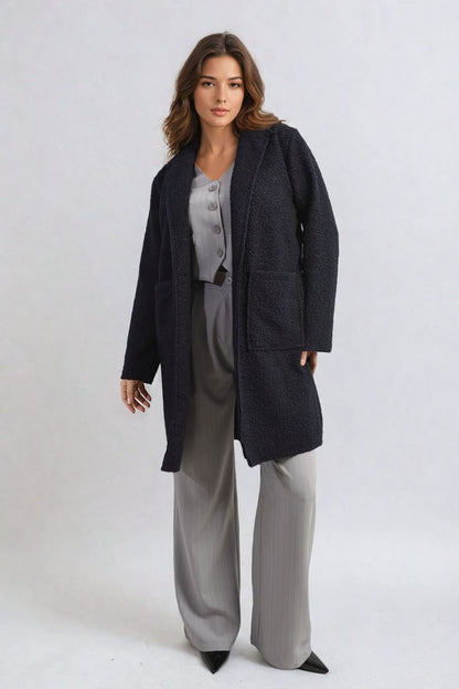 Veste texturée boutonnée avec poches avant