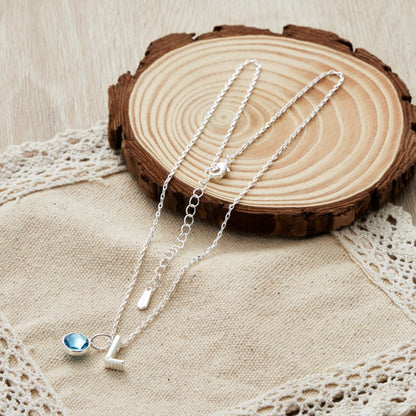 Initial L Necklace with Birthstone Charm Created with Zircondia® Crystals
