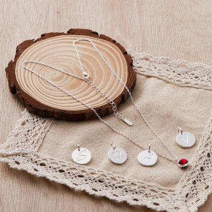 July (Ruby) Birthstone Necklace with Initial Charm (A to Z) Created with Zircondia® Crystals