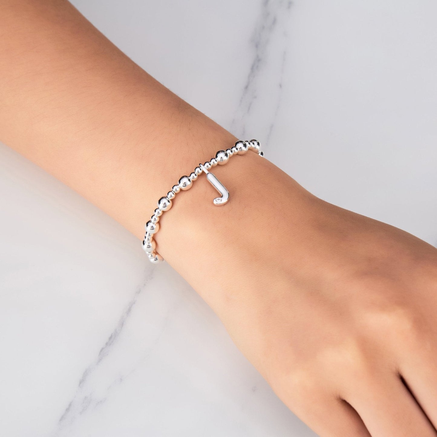 Letter J Initial Stretch Bracelet Created with Zircondia® Crystals