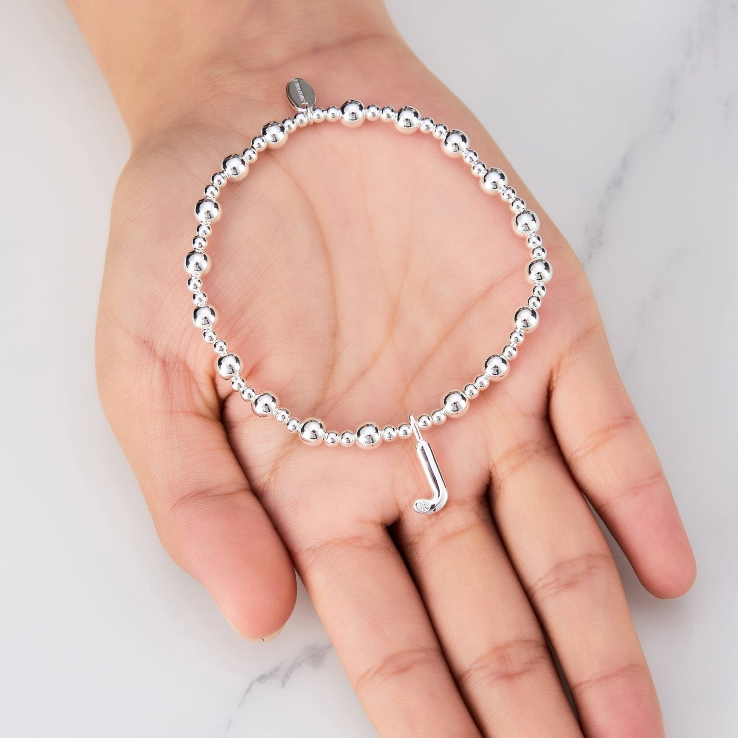 Letter J Initial Stretch Bracelet Created with Zircondia® Crystals