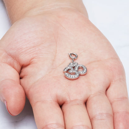 Om Charm Created with Zircondia® Crystals