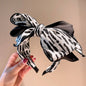 Oversized Bow Zebra Print Headband