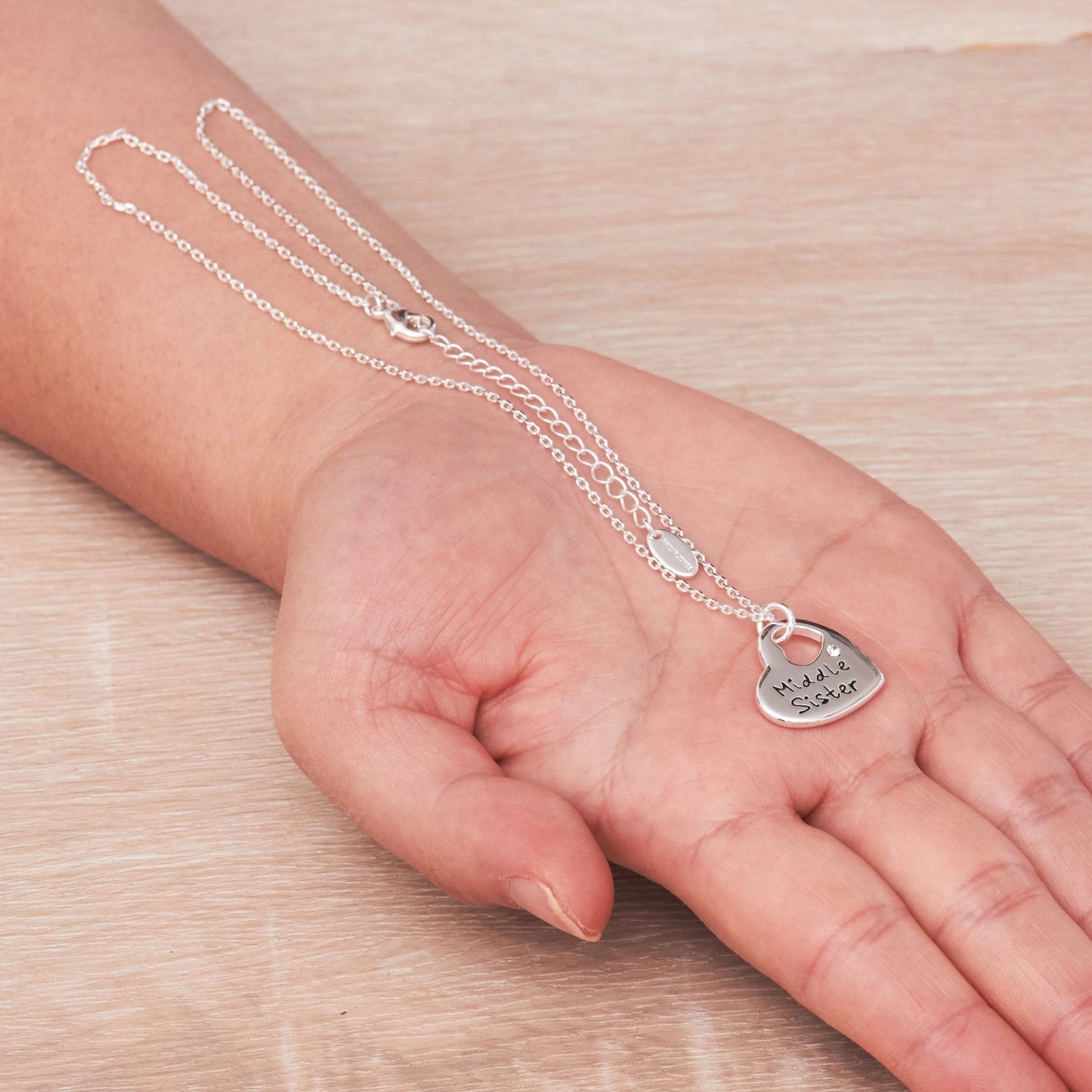 Rhodium Plated Middle Sister Heart Necklace Created with Zircondia® Crystals