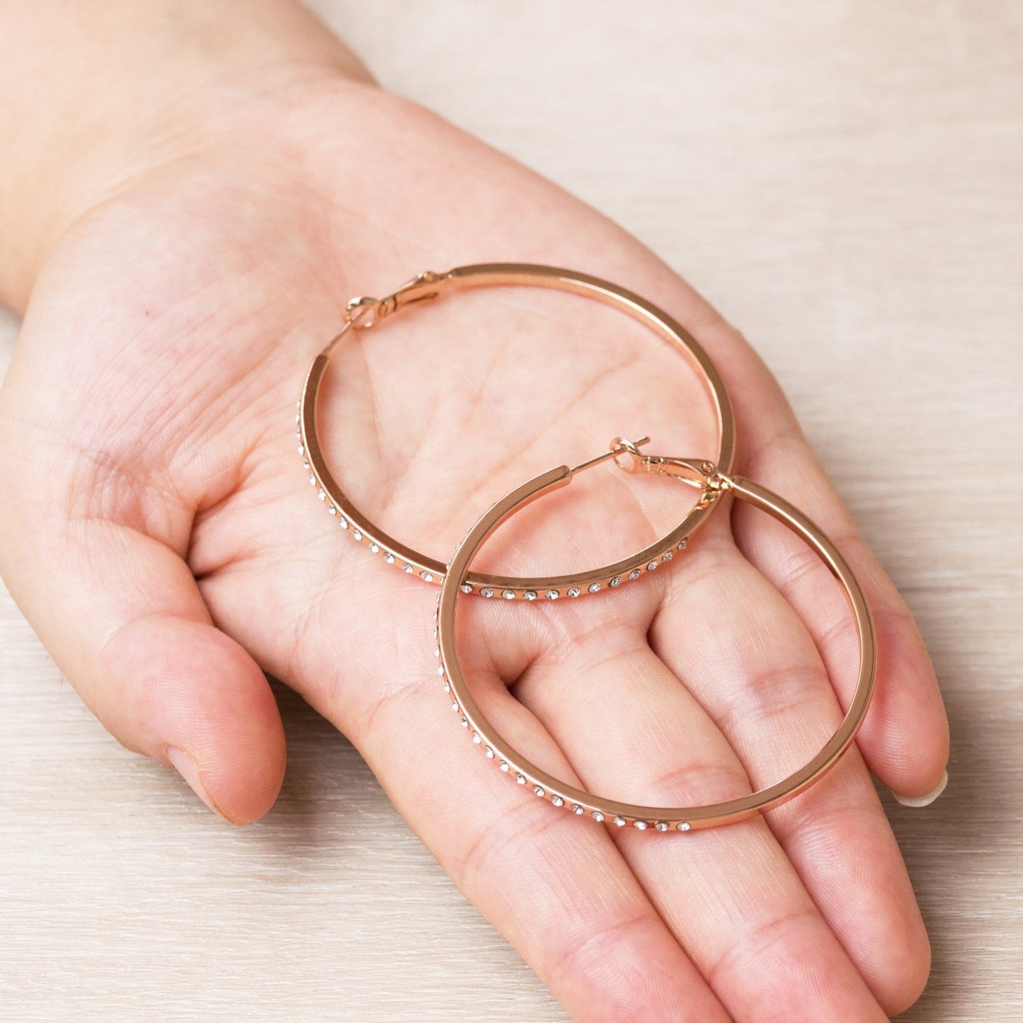 Rose Gold Plated 50mm Hoop Earrings Created with Zircondia® Crystals