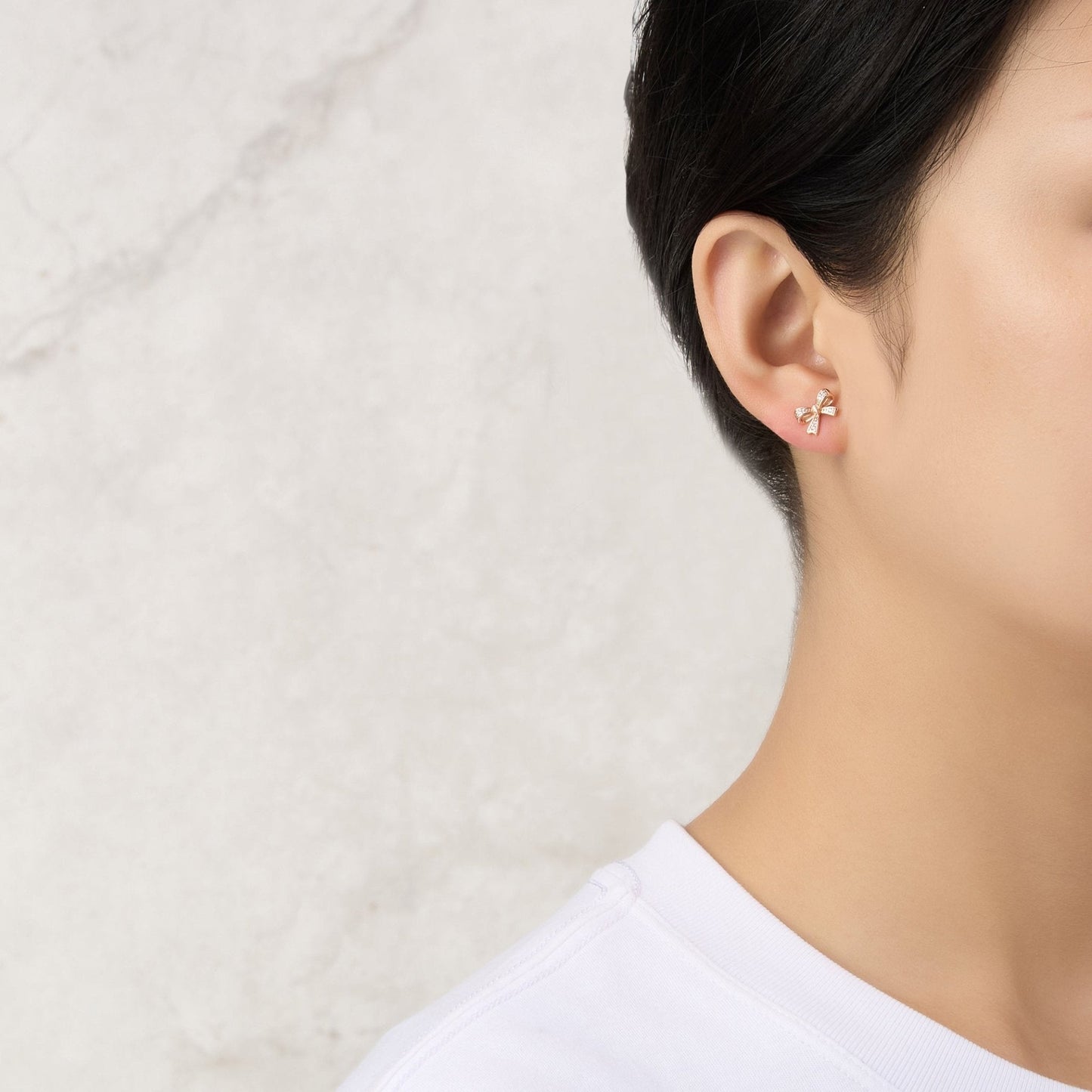 Rose Gold Plated Bow Earrings Created with Zircondia® Crystals