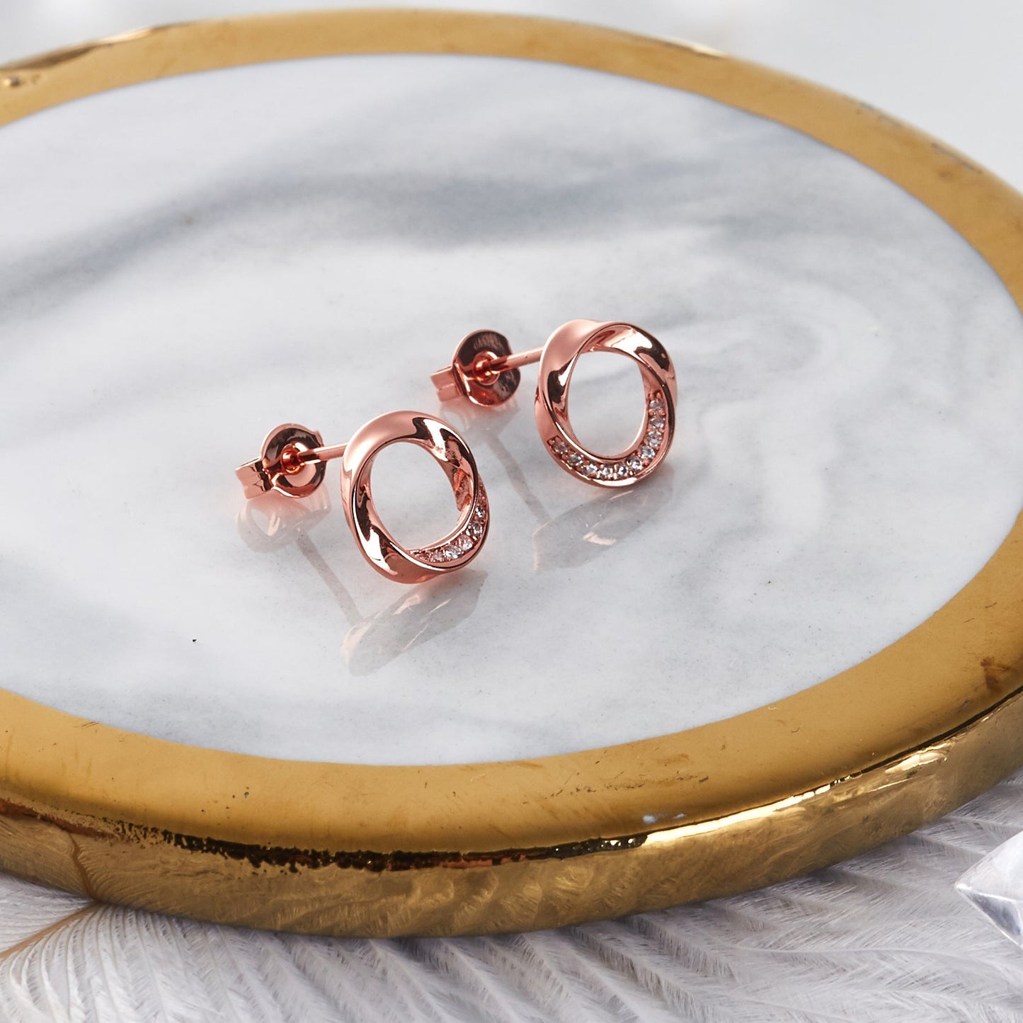 Rose Gold Plated Circle Twist Earrings Created with Zircondia® Crystals