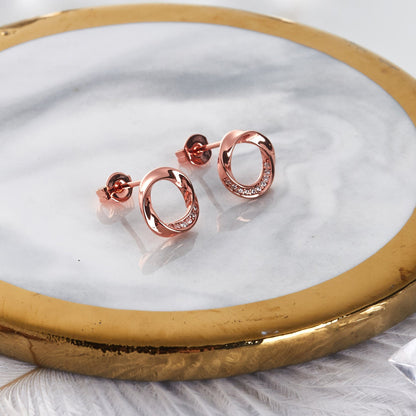 Rose Gold Plated Circle Twist Earrings Created with Zircondia® Crystals