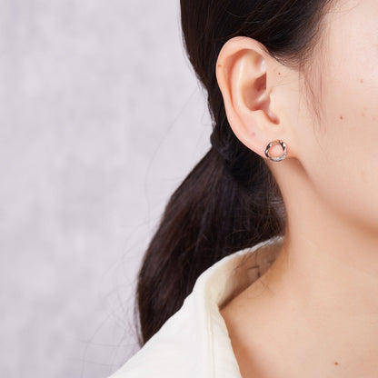 Rose Gold Plated Circle Twist Earrings Created with Zircondia® Crystals