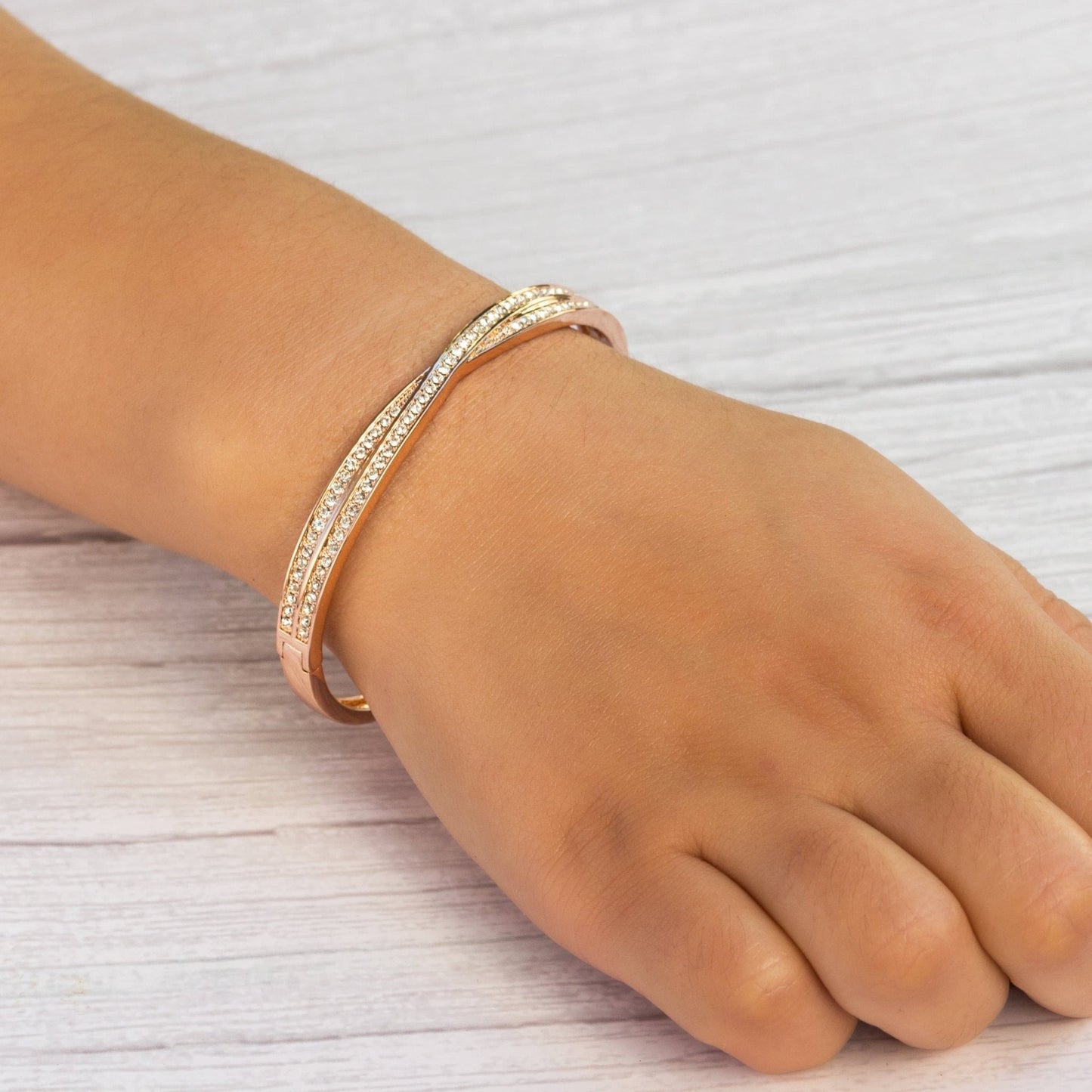 Rose Gold Plated Crossover Bangle Created with Zircondia® Crystals (7 Inch)