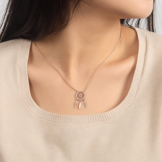 Collier attrape-rêves plaqué or rose créé avec des cristaux Zircondia®