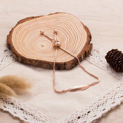 Rose Gold Plated Feather Friendship Bracelet Created with Zircondia® Crystals