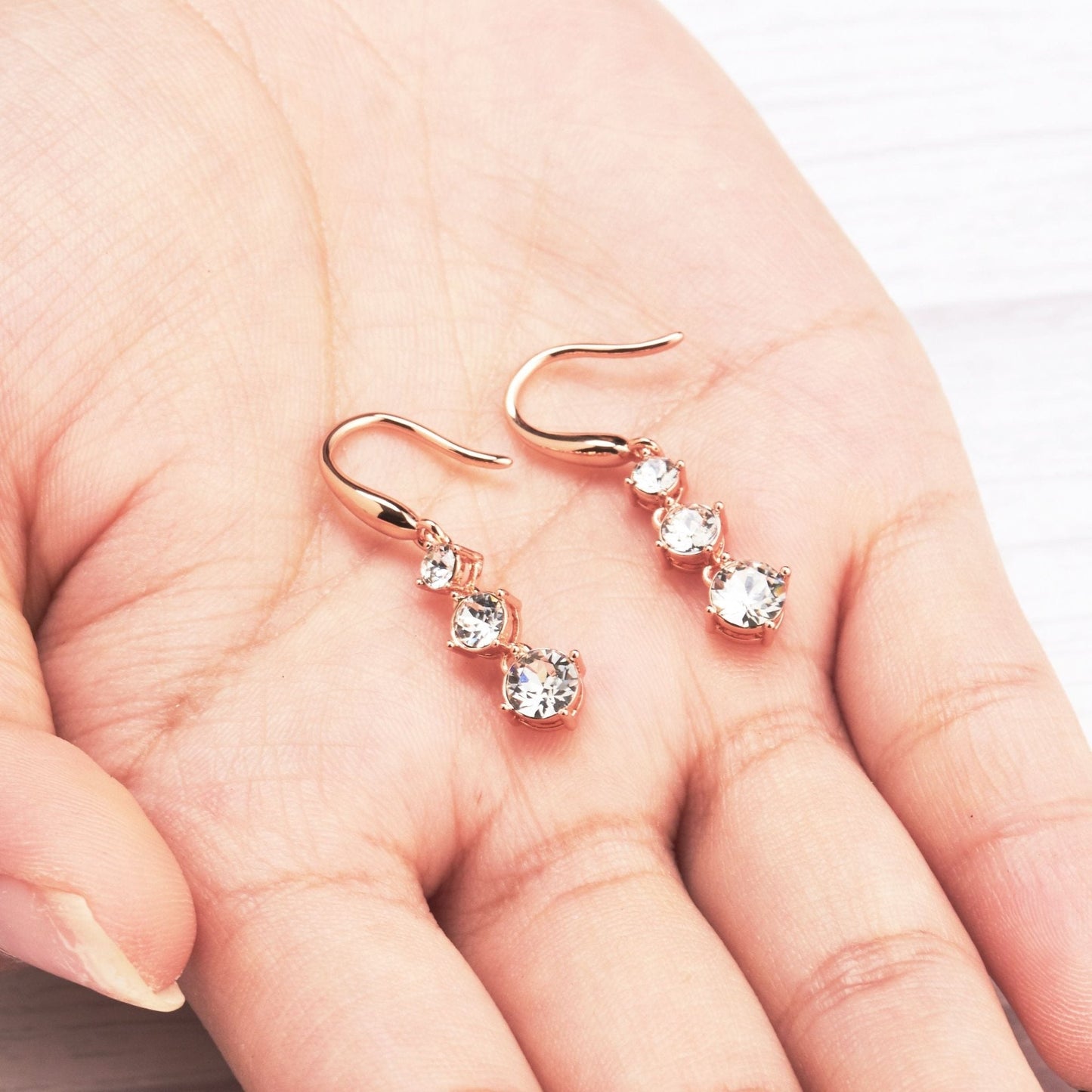 Rose Gold Plated Graduated Drop Earrings Created with Zircondia® Crystals