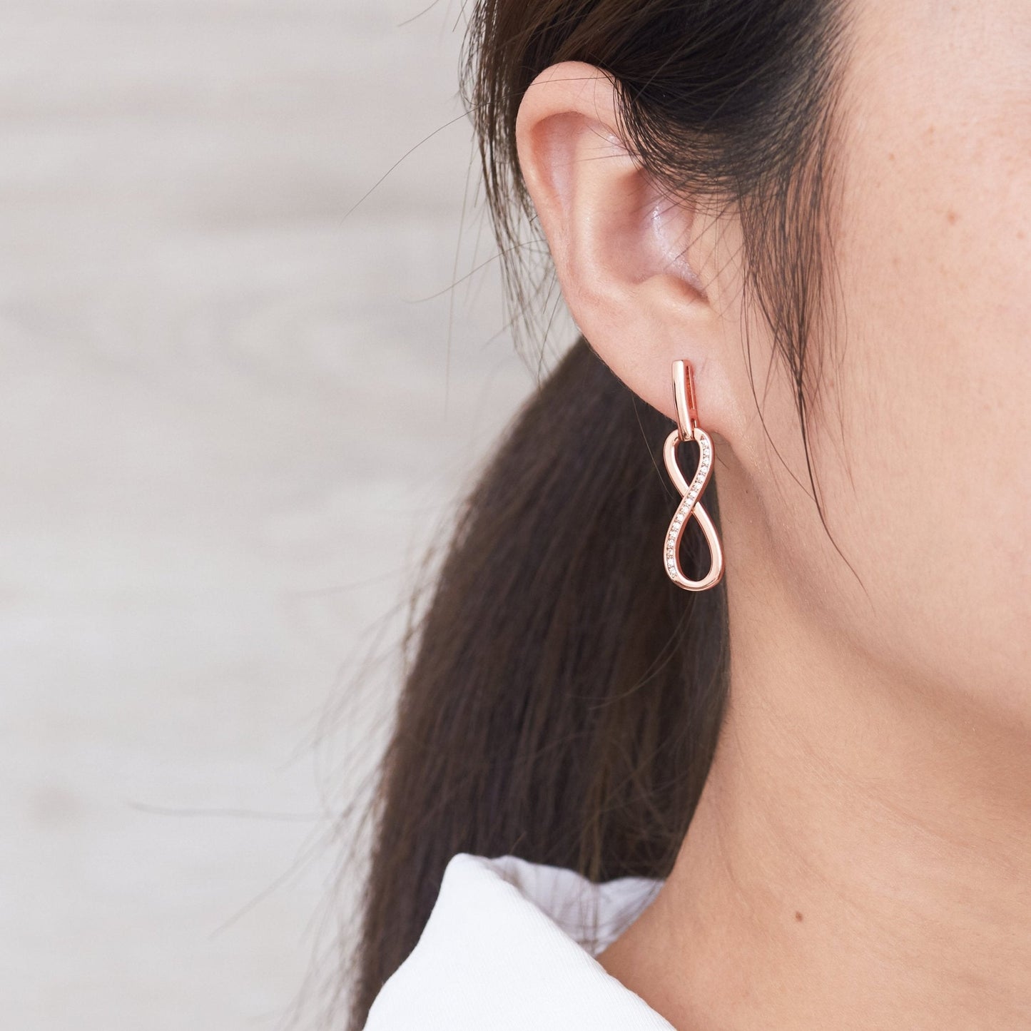 Rose Gold Plated Infinity Drop Earrings Created with Zircondia® Crystals