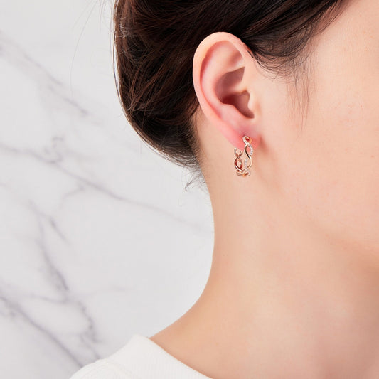 Rose Gold Plated Infinity Hoop Earrings Created with Zircondia® Crystals