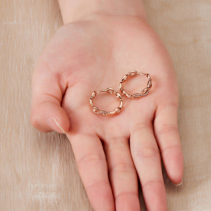 Rose Gold Plated Infinity Hoop Earrings Created with Zircondia® Crystals