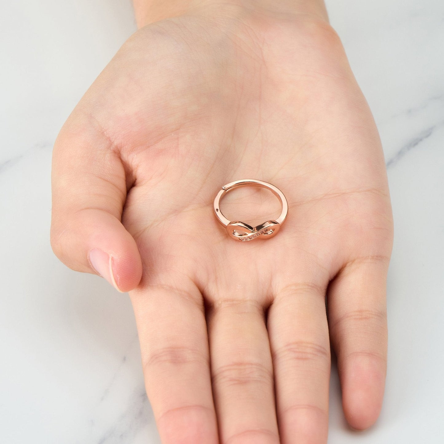 Rose Gold Plated Infinity Ring Created with Zircondia® Crystals