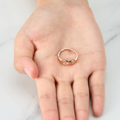 Rose Gold Plated Infinity Ring Created with Zircondia® Crystals