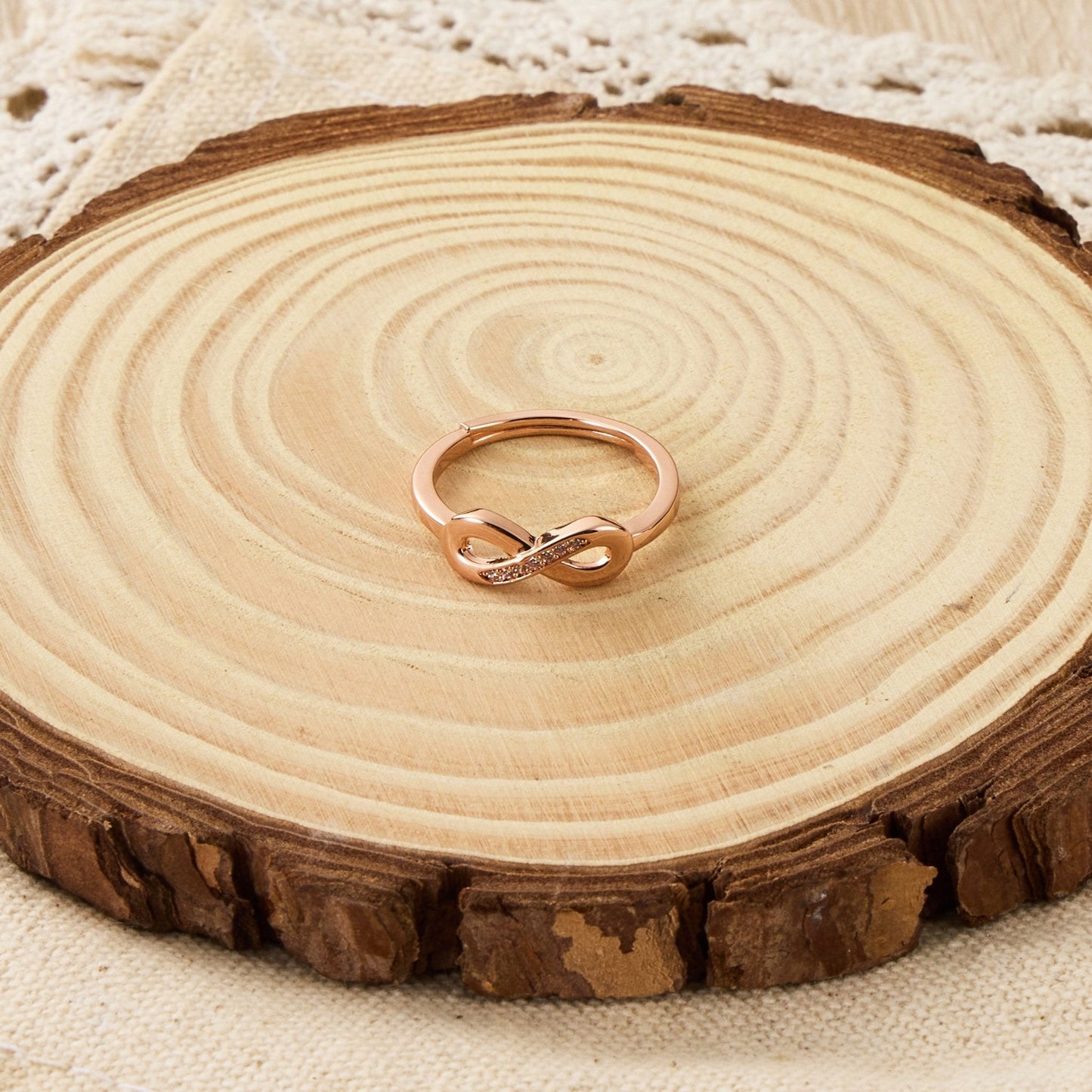 Rose Gold Plated Infinity Ring Created with Zircondia® Crystals