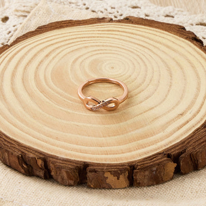 Rose Gold Plated Infinity Ring Created with Zircondia® Crystals