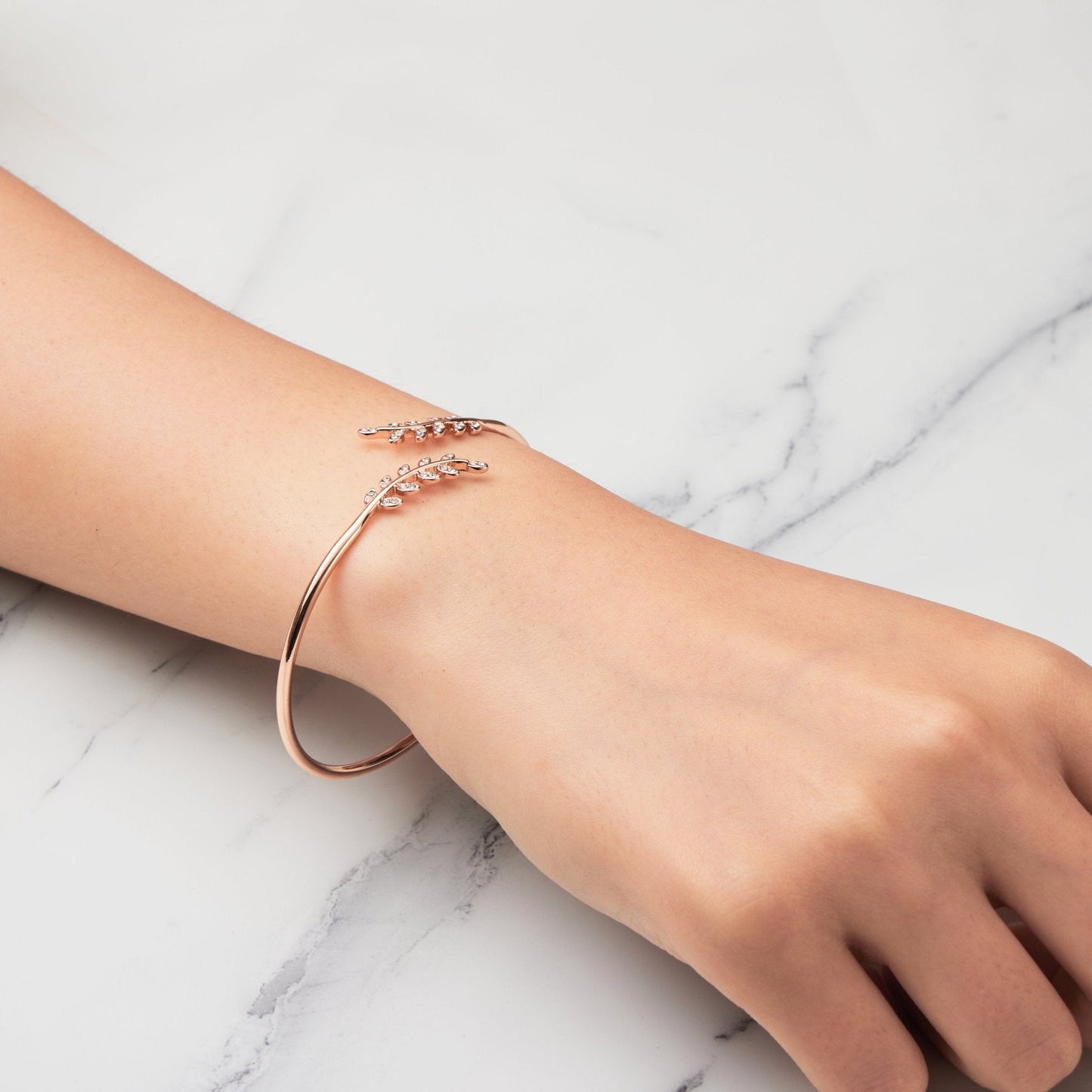 Rose Gold Plated Leaf Bangle Created with Zircondia® Crystals