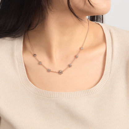 Collier multi-marguerites plaqué or rose