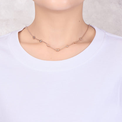 Collier multi-marguerites plaqué or rose