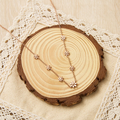 Collier multi-marguerites plaqué or rose
