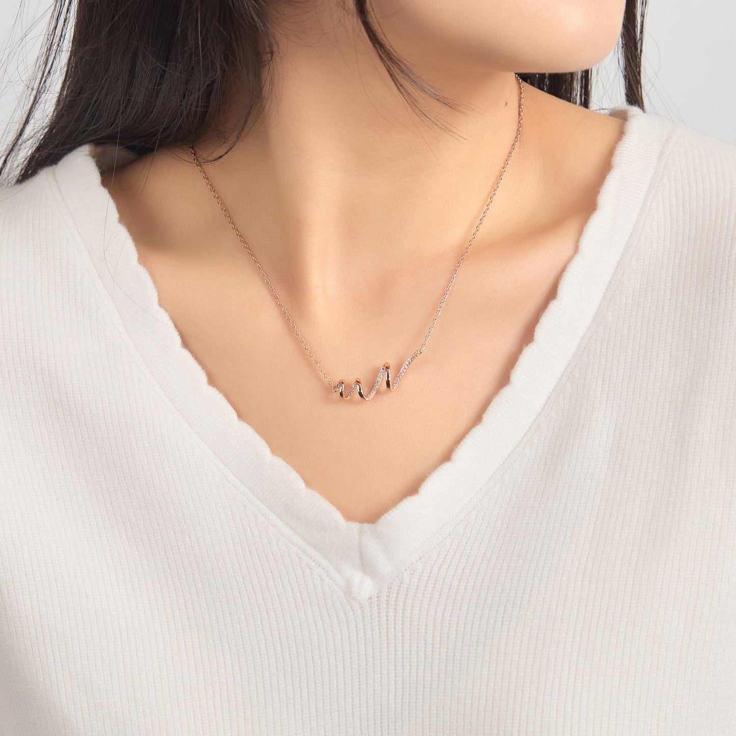 Rose Gold Plated Spiral Necklace Created with Zircondia® Crystals