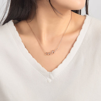 Rose Gold Plated Spiral Necklace Created with Zircondia® Crystals