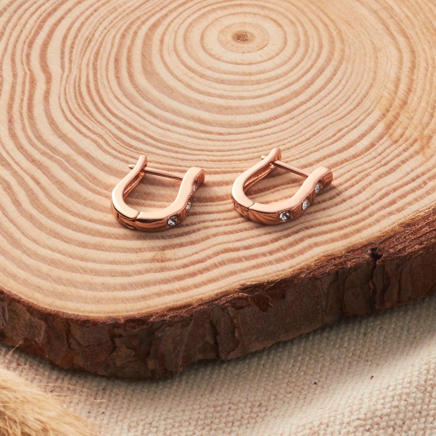 Rose Gold Plated Three Stone Hoop Earrings Created with Zircondia® Crystals