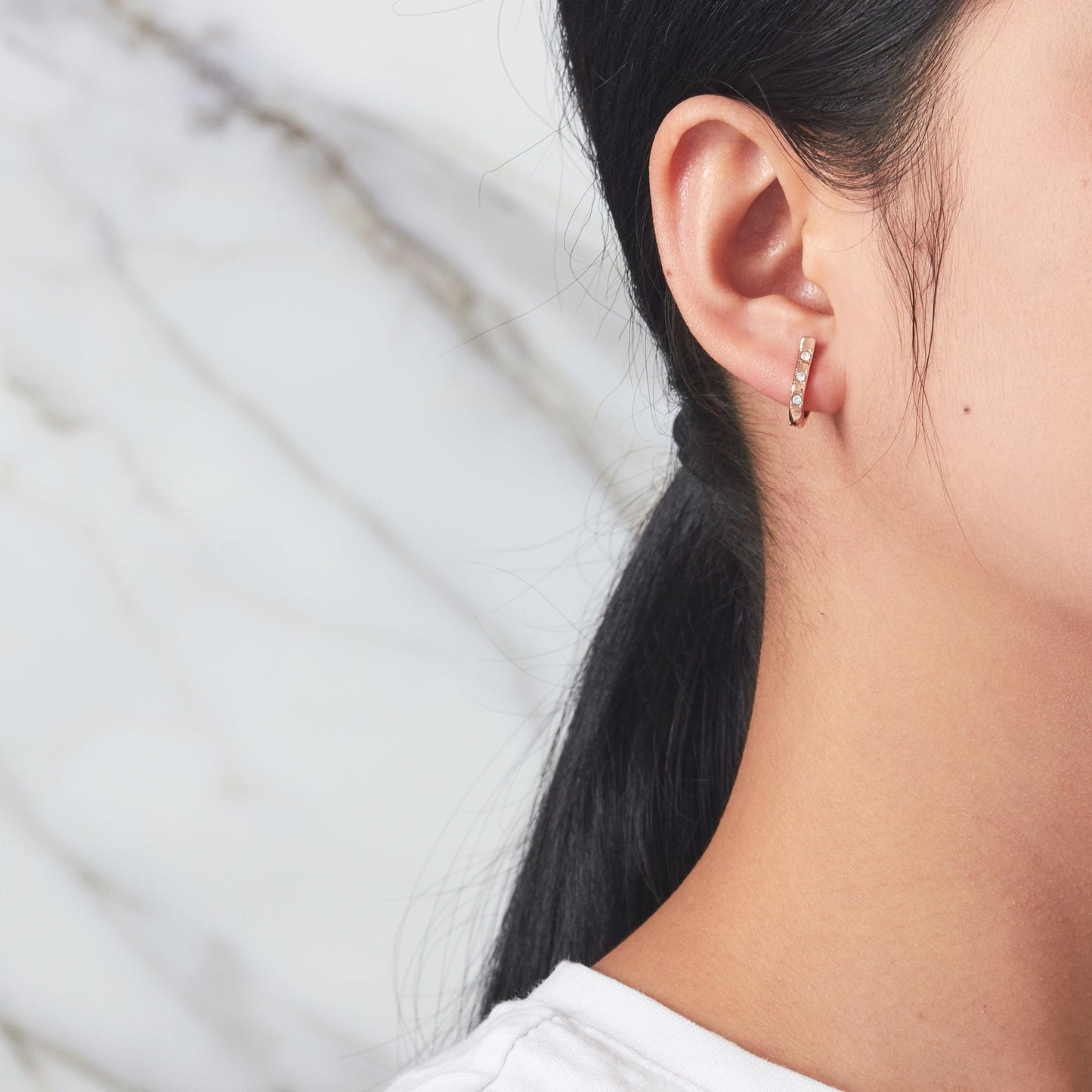 Rose Gold Plated Three Stone Hoop Earrings Created with Zircondia® Crystals