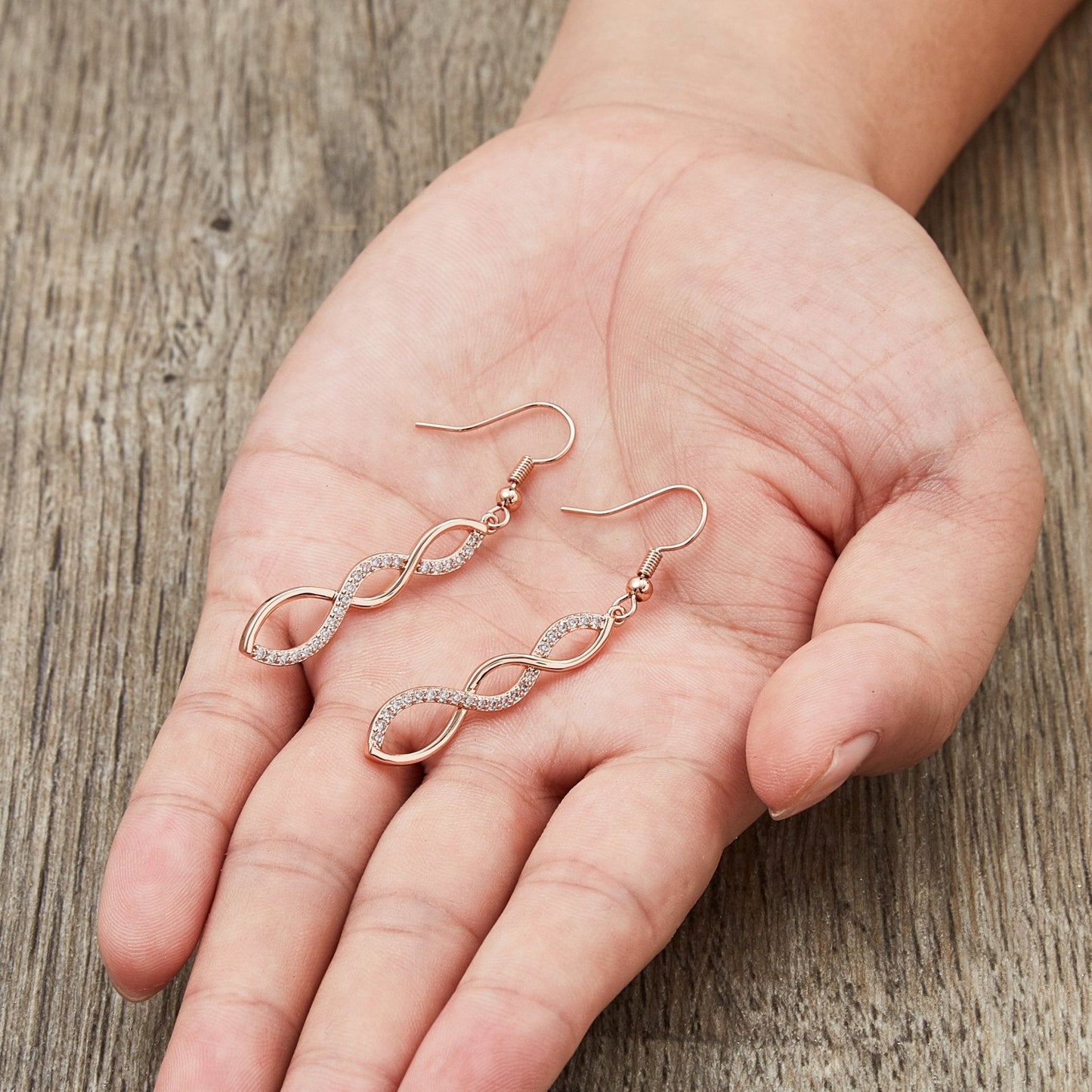 Rose Gold Plated Twist Drop Earrings Created with Zircondia® Crystals