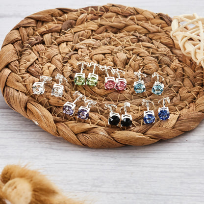 Seven Pack of Solitaire Earrings Created with Zircondia® Crystals