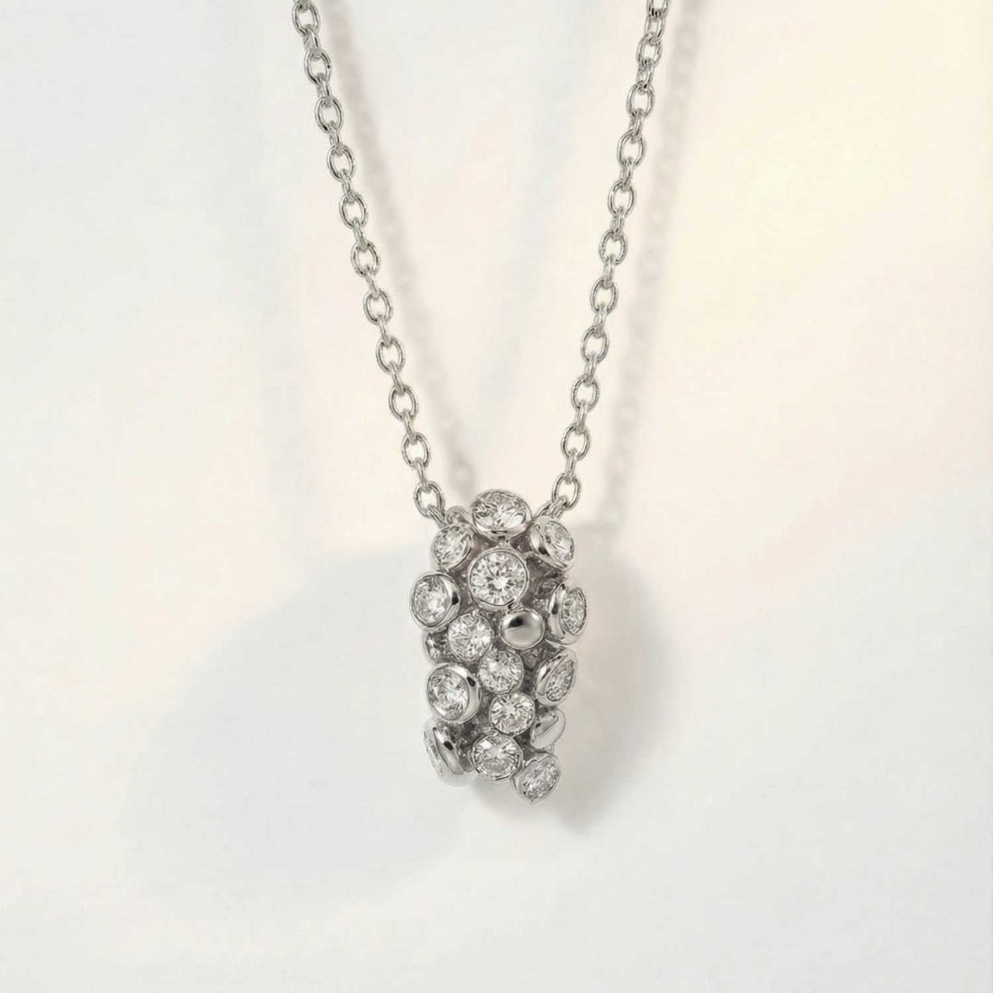 Silver Lyra Necklace with Barnacles and White Topaz
