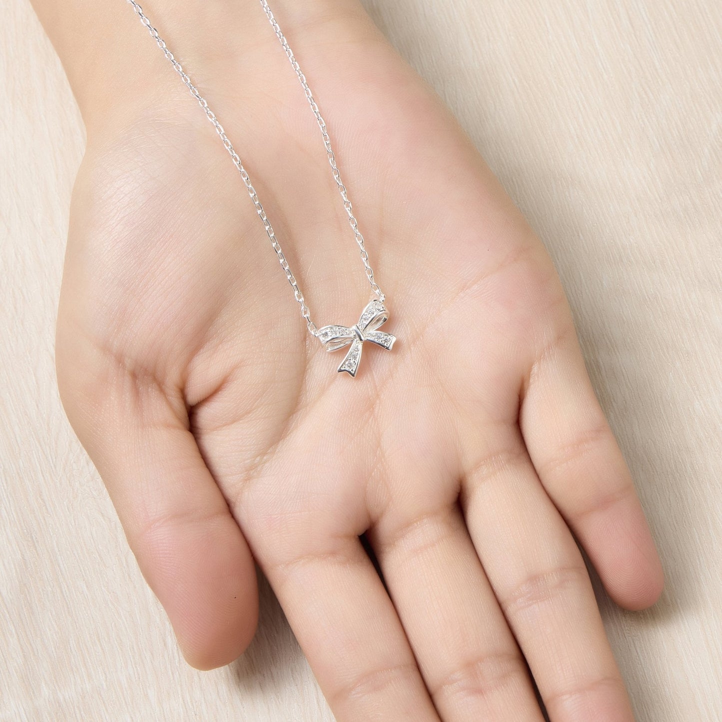 Silver Plated Bow Necklace Created with Zircondia® Crystals