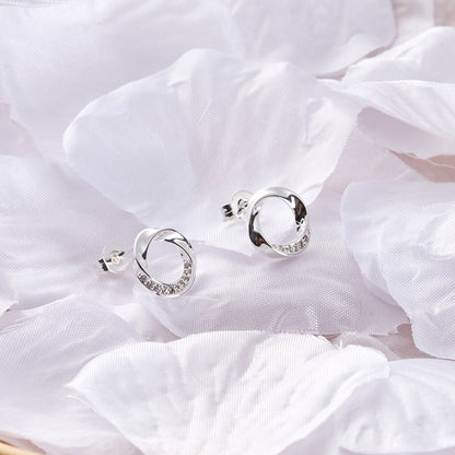 Silver Plated Circle Twist Earrings Created with Zircondia® Crystals