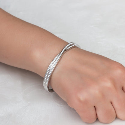 Silver Plated Crossover Bangle Created with Zircondia® Crystals (7 Inch)