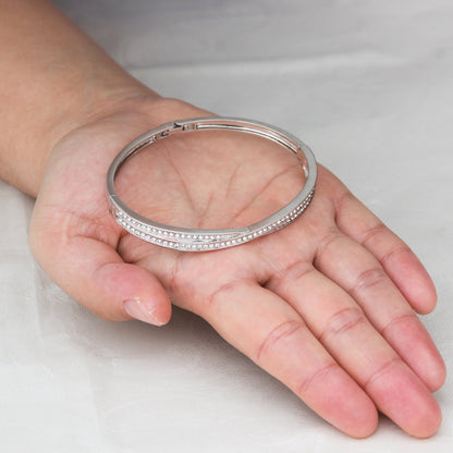 Silver Plated Crossover Bangle Created with Zircondia® Crystals (7 Inch)