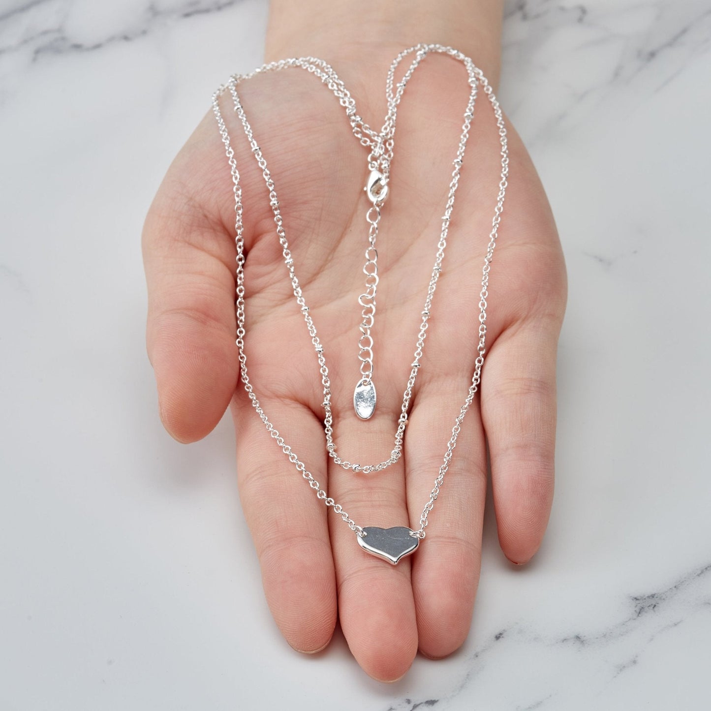 Collier double cœur plaqué argent