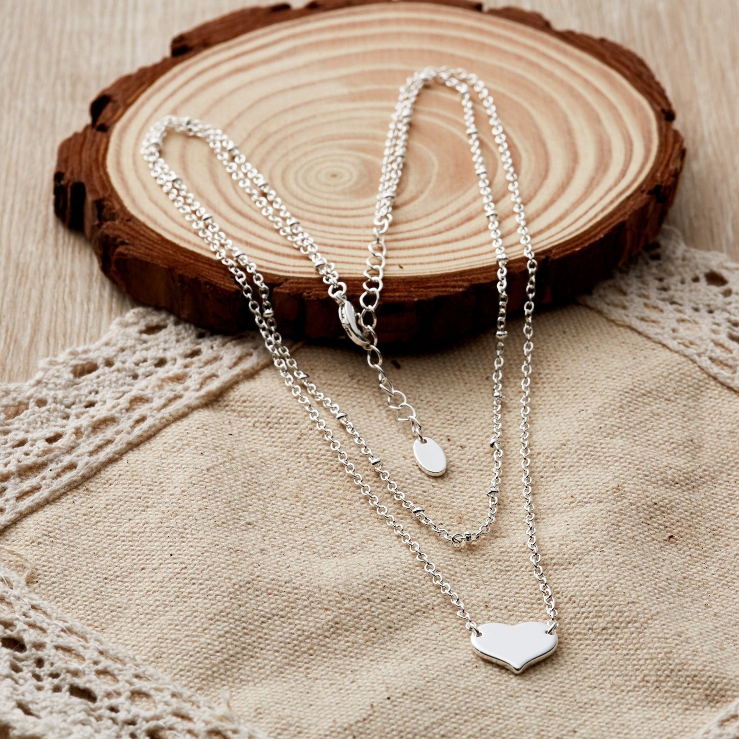 Collier double cœur plaqué argent